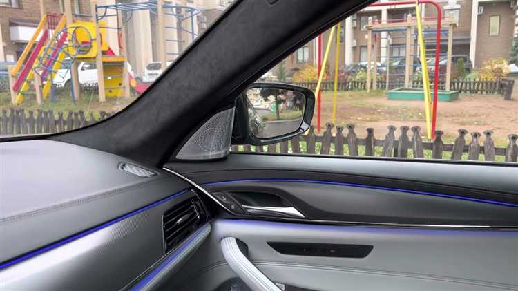 Где в настройках iDrive отключается опускание зеркала
